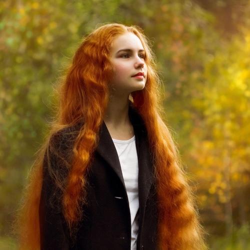 Cute long hair redhead secretary