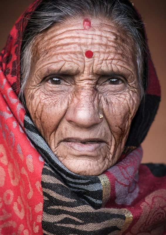 Old Nepalese woman wearing traditional costume. People and culture of Nepal