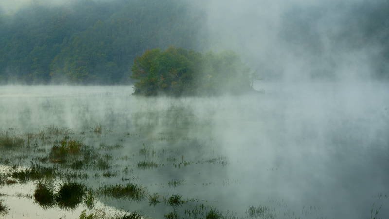 Water fog and small island